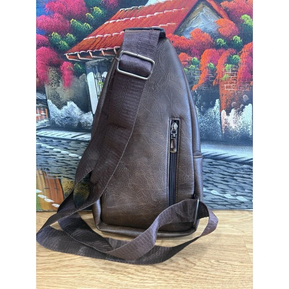 New York Brown Sling Bag Crossbody Pack Adjustable Strap Zip Closure Pockets